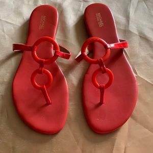 Michael Kors orange leather sandals with orange rings on top worn once size 10